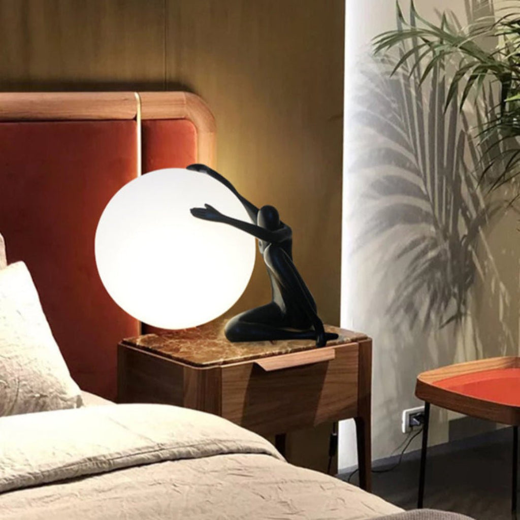 Humanoid Ball Holding Table Lamp
