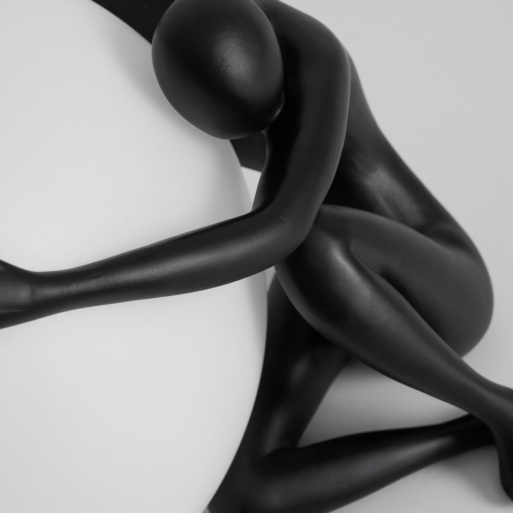 Humanoid Ball Holding Table Lamp