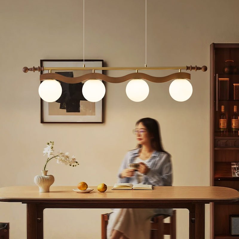 Sinuara Ribbon Globe Linear Chandelier